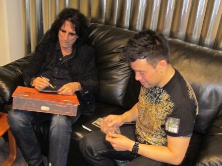 Alice Cooper signing my Feed My Frankenstein CD